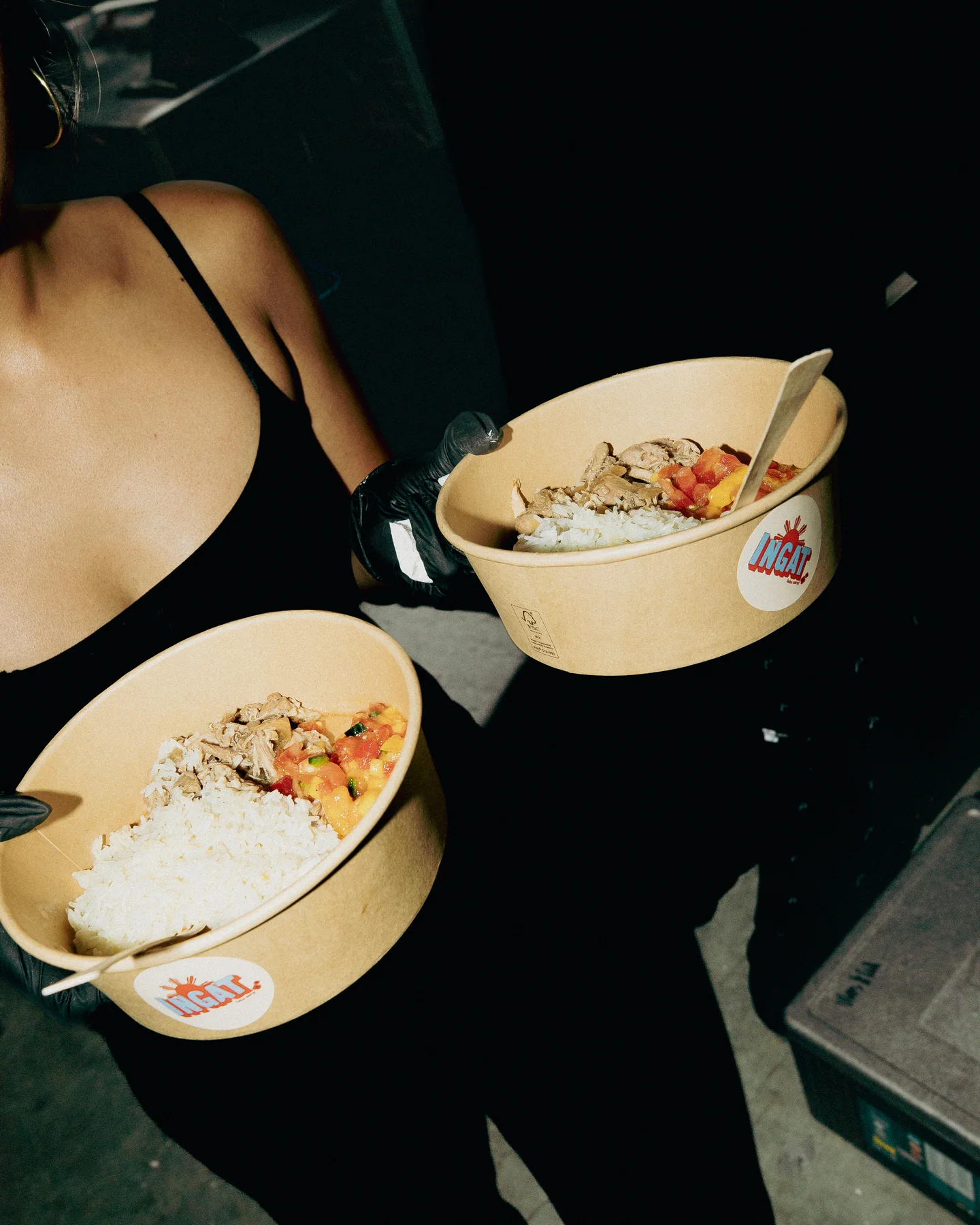 Two dishes of food being held beside the stall at Hapjesfestijn 2025